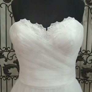 Lillian West wedding dress. New with tags.